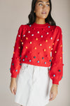 The Halls PomPom Knit Sweater in Red