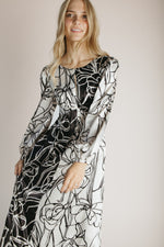 The Paulina Contrast Floral Maxi Dress in Black + White