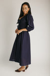 The Travillo Velvet Bow Detail Midi Dress in Navy