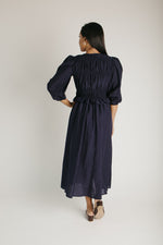 The Travillo Velvet Bow Detail Midi Dress in Navy