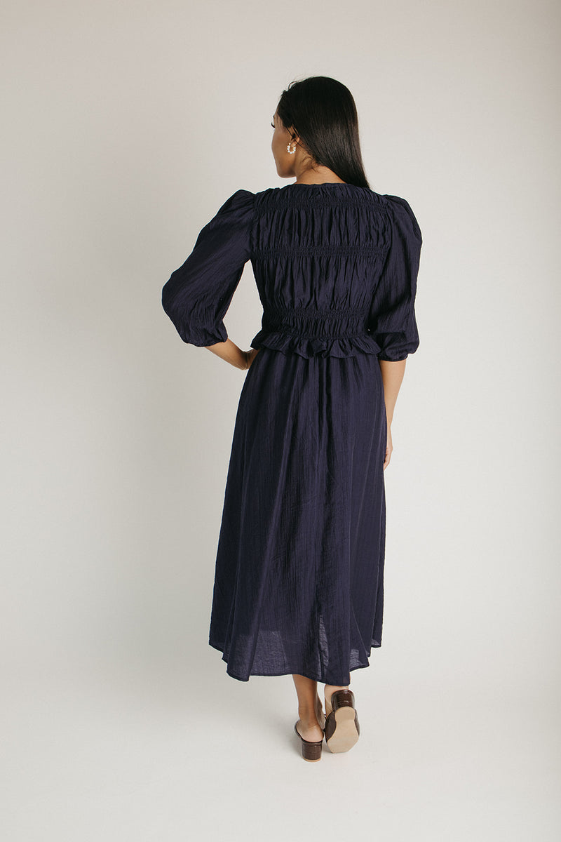 The Travillo Velvet Bow Detail Midi Dress in Navy