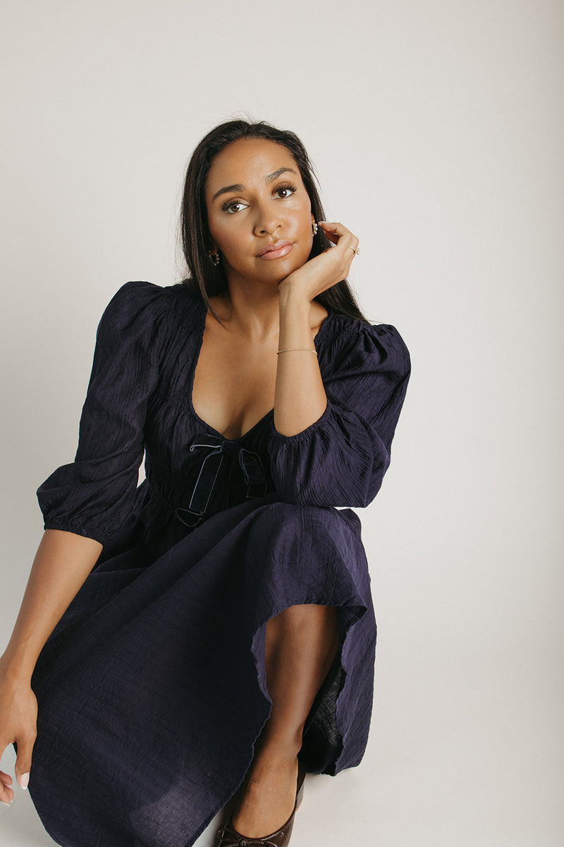 The Travillo Velvet Bow Detail Midi Dress in Navy