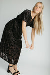 The Raven Velvet Textured Midi Dress in Black