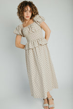 The Stacy Polka Dot Peplum Midi Dress in Taupe + Brown