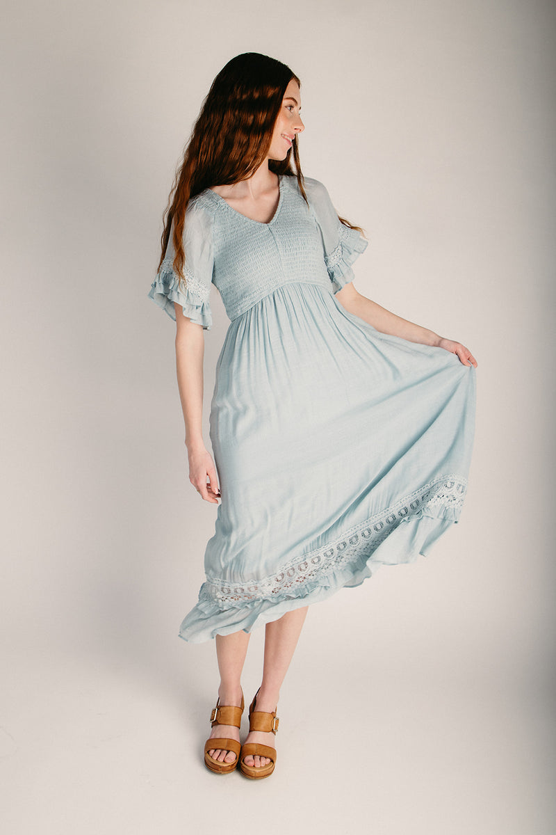 light blue smocked dress The Hannah Smocked Midi Dress in Light Blue Large
