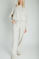 The Goldie Bubble Hem Pullover in Heathered Oat