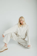 The Goldie Bubble Hem Pullover in Heathered Oat