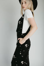 The Ammons Corduroy Embroidered Jumpsuit in Washed Black
