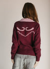The Alessi Wester Motif Sweater in Chocolate + Pink