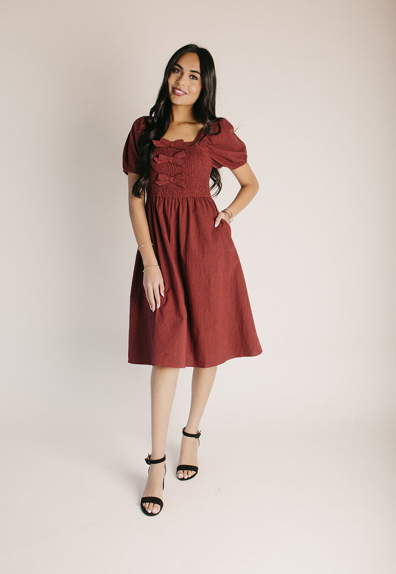 The Pavia Bow Detail Gingham Dress in Brick + Navy
