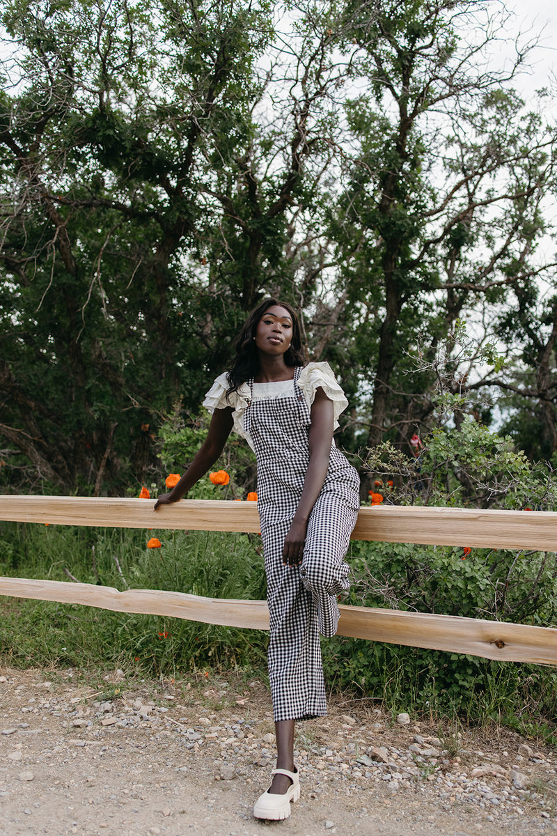 The Breigh Checkered Jumpsuit in Black + Cream