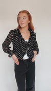 The Trudell Ruffle Ditsy Floral Blouse in Black