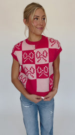 The Seroka Bow Detail Checkered Sweater Vest in Red Multi