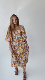 The Penner Square Neck Floral Midi Dress in Rust