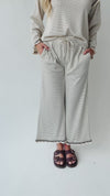 The Lyla Ruffle Edge Striped Pant in Cream + Brown