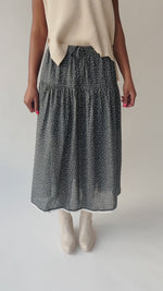 The Axelson Floral Printed Midi Skirt in Charcoal