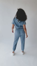 The Sullins Hooded Jumpsuit in Denim Blue