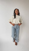 The Trisney Mock Neck Sweater in Ivory
