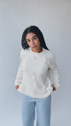 The Lundwall Satin Bow Sweater in Ivory