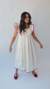 The Midgely Smocked Ruffle Detail Dress in Cream + Red