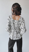 The Tola Tie Detail Blouse in Black Floral