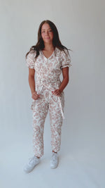 The Roxand Puff Sleeve Jumpsuit in Ivory + Pink