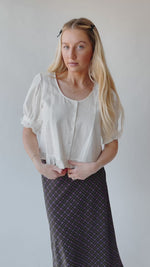 The Landerkin Ruffle Button-Up Blouse in Cream