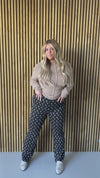 The Sonia Daisy Print Pants in Black