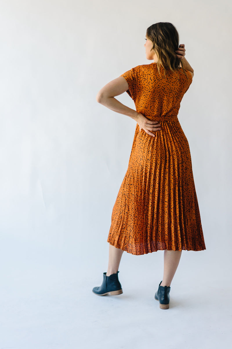 The Wanda Pleated Dot Midi Dress in Rust