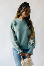 The Gina Embroidered Ruffle Detail Sweater in Aqua
