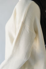 The Sonya V-Neck Ribbed Knit Sweater in Cream