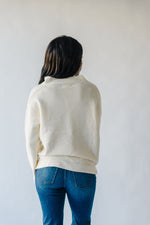 The Sonya V-Neck Ribbed Knit Sweater in Cream