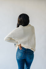 The Sonya V-Neck Ribbed Knit Sweater in Cream