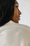 The Sonya V-Neck Ribbed Knit Sweater in Cream