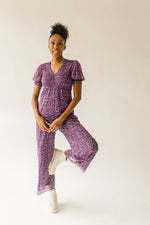 The Peden Smocked Jumpsuit in Floral Multi