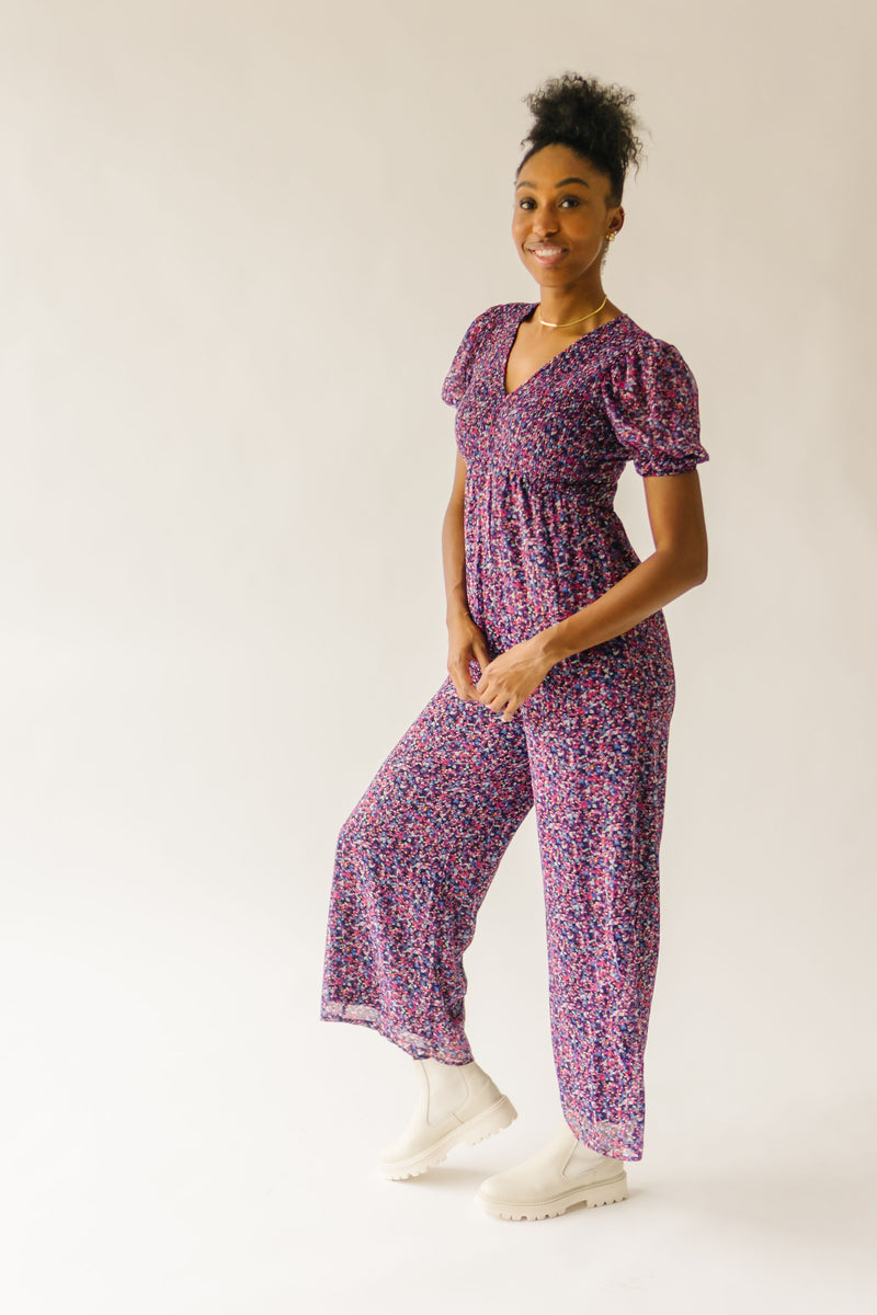 The Peden Smocked Jumpsuit in Floral Multi