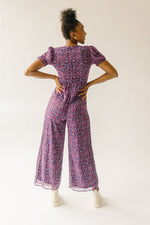 The Peden Smocked Jumpsuit in Floral Multi