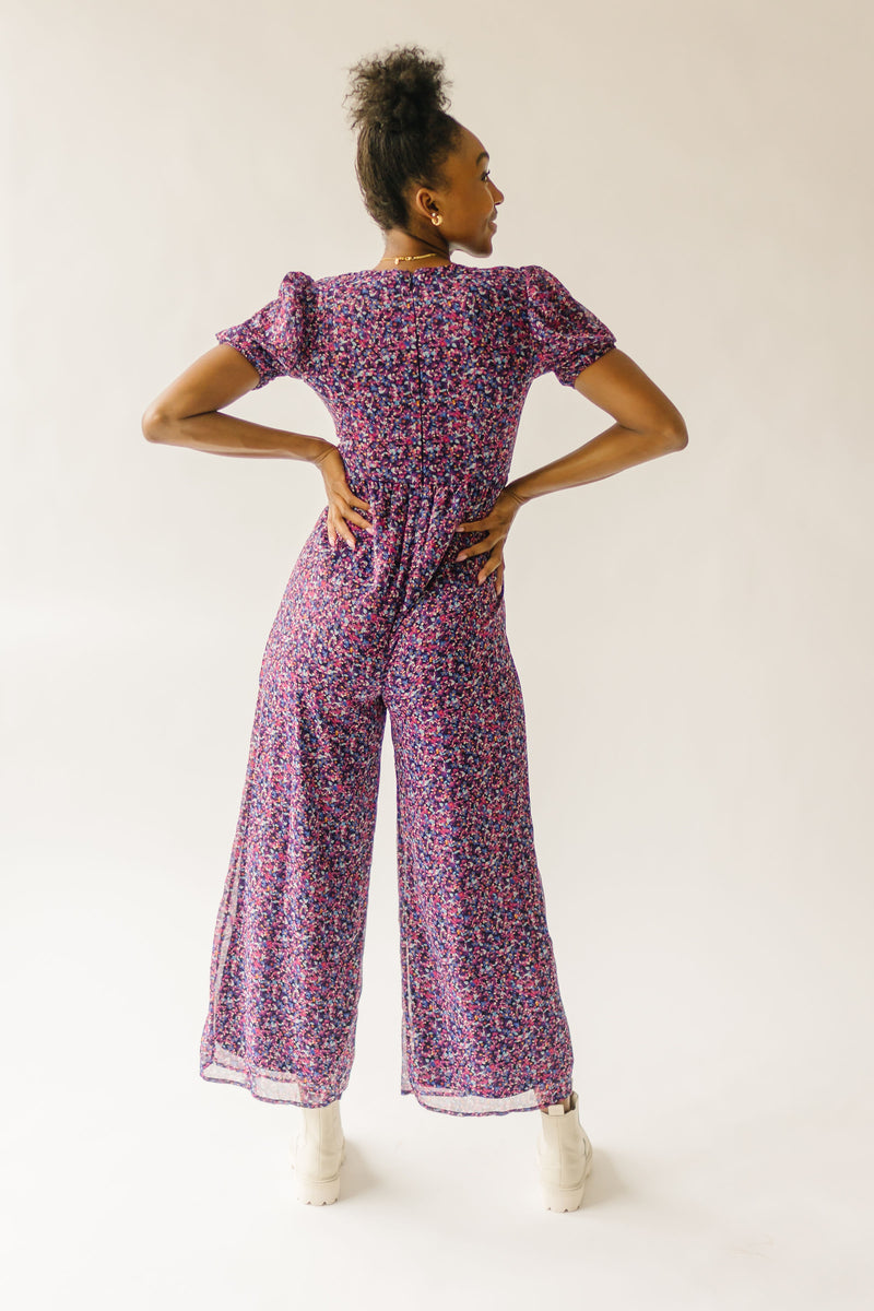 The Peden Smocked Jumpsuit in Floral Multi