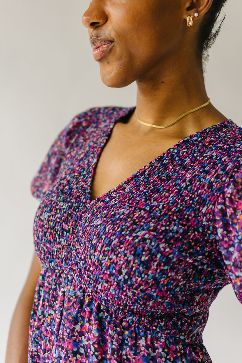 The Peden Smocked Jumpsuit in Floral Multi