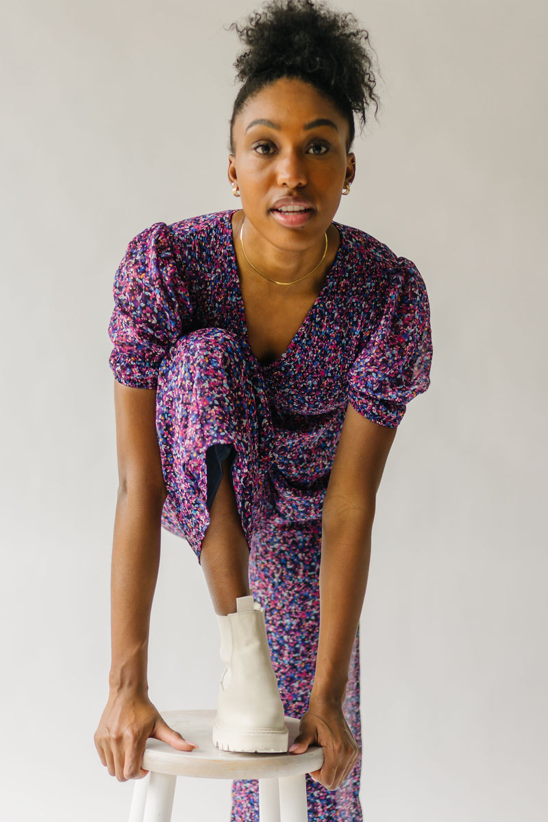 The Peden Smocked Jumpsuit in Floral Multi