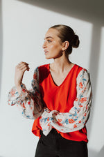 The Carine V-Neck Colorblock Blouse in Red + White