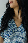 The Delgado Smocked Floral Dress in Blue Multi