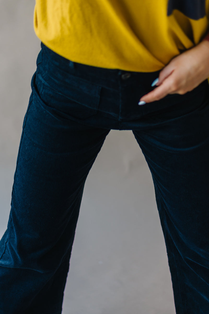 The Sitka Corduroy Wide Leg Crop Pants in Navy, studio shoot; front view