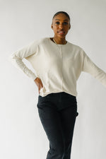 The Feller Textured Sweater in Cream, studio shot; front view