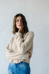 The Riggs Button-Down Sweater in Natural, studio shoot; front view