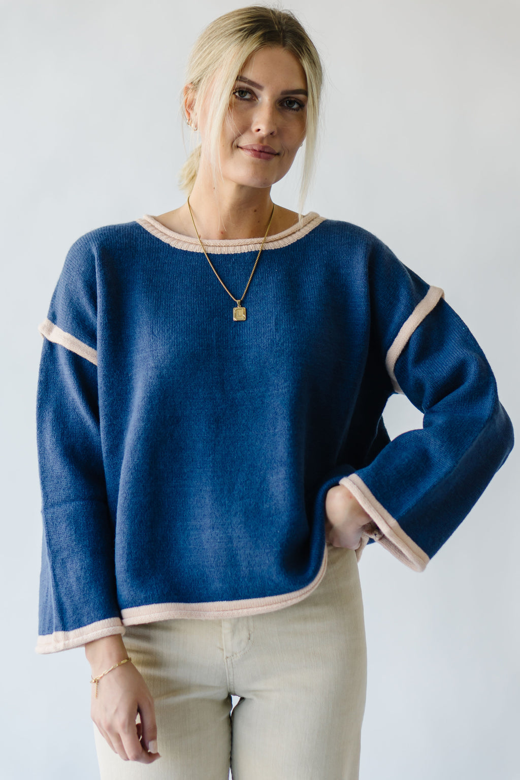 The Halston Pullover Sweater in Midnight, studio shoot; front view