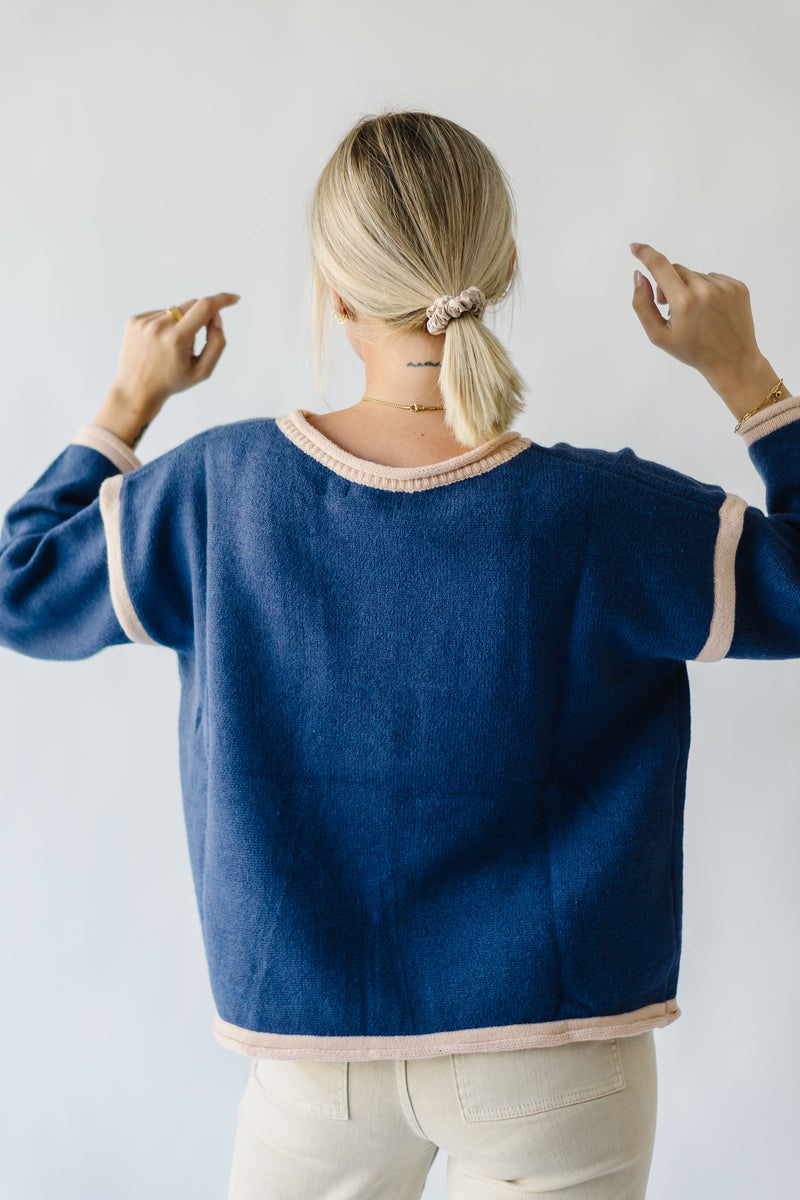 The Halston Pullover Sweater in Midnight, studio shoot; front view