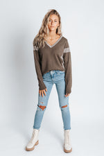 The Chip Sweater in Dark Brown, studio shoot; front view
