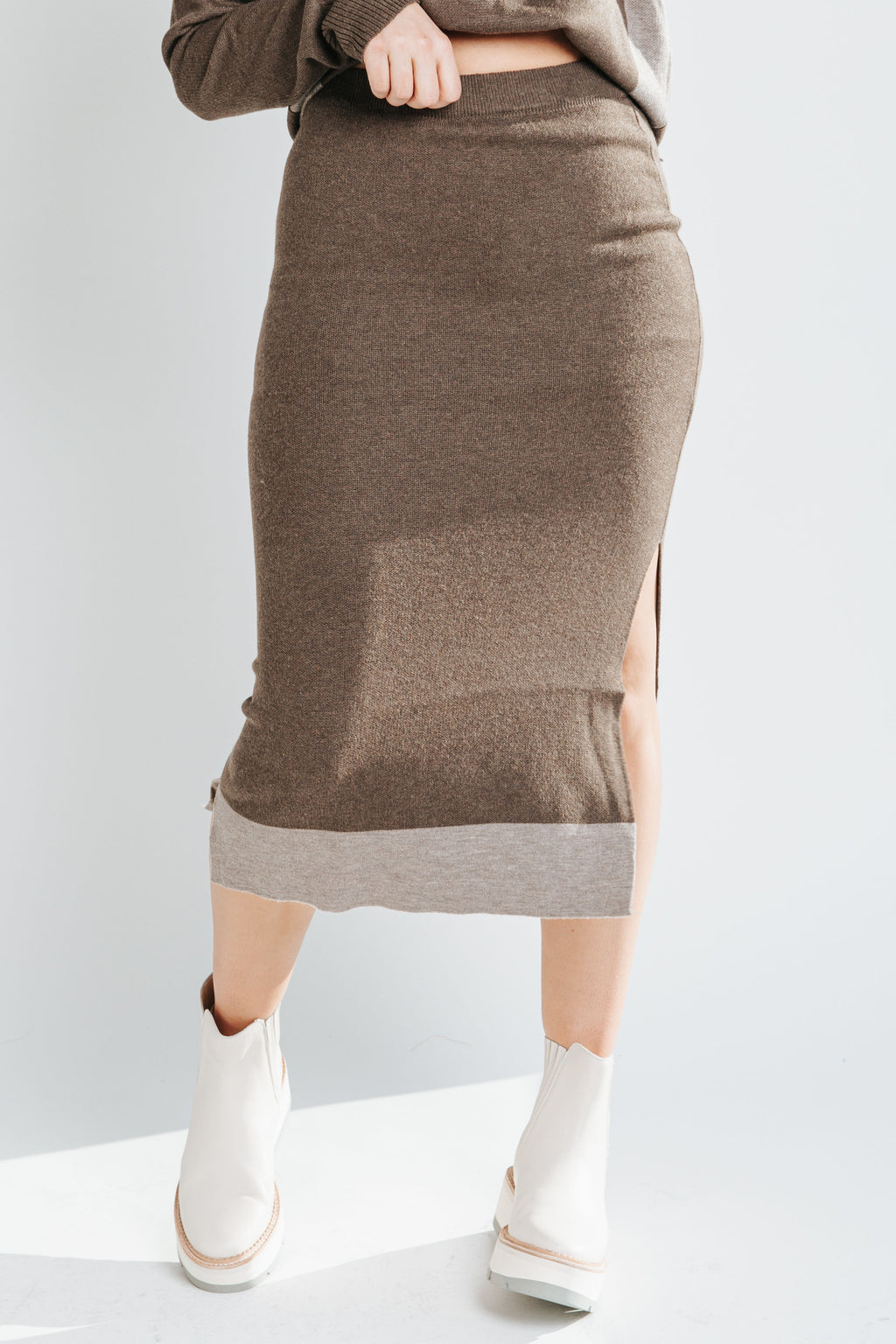The Dale Sweater Skirt in Dark Brown, studio shoot; front view