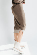 The Dale Sweater Skirt in Dark Brown, studio shoot; side view